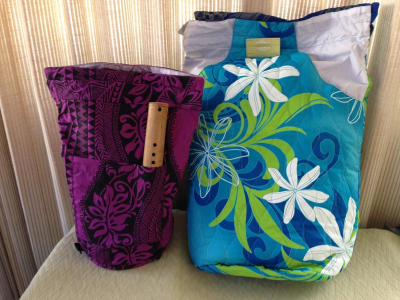 ipu-bag-feature A set of ipu bags. On the left is a small Ipu bag featured in the Violet-Gray pattern, and on the right is a large Ipu bag in the Blue pattern.